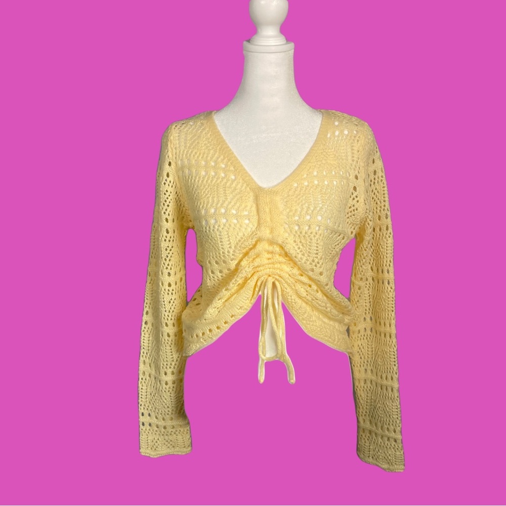 Yellow knit long sleeve shirt with tie feature in front